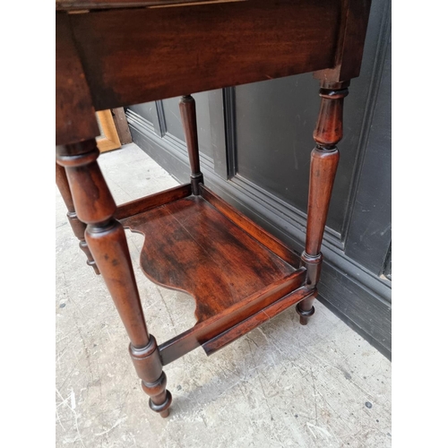 1062 - An unusual mahogany washstand, 63.5cm wide.