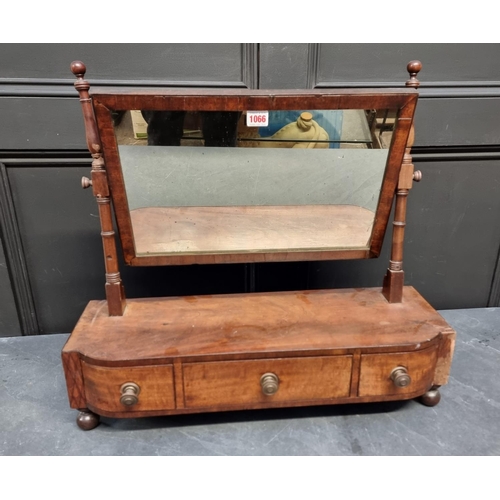 1066 - An early 19th century mahogany toilet mirror, 61.5cm wide. 