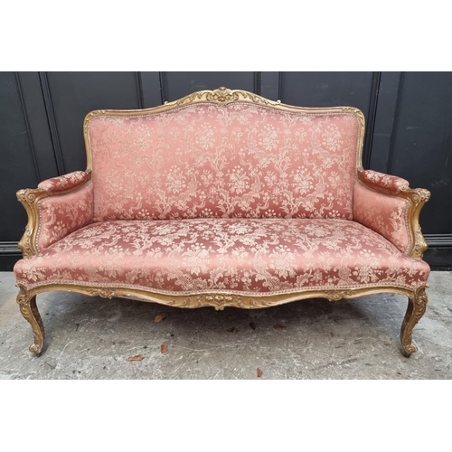 1078 - A Louis XV style carved giltwood settee, 156cm wide.