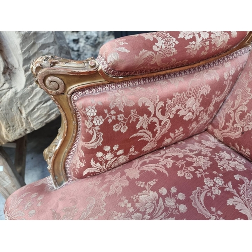 1078 - A Louis XV style carved giltwood settee, 156cm wide.