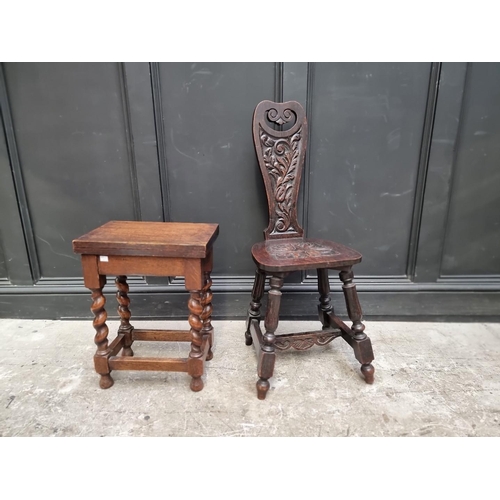 1079 - A 1920s carved oak spinning stool; together with another 1920s oak table, 38cm wide. (2)... 