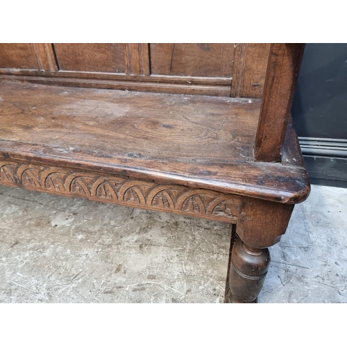 1080 - An antique oak and elm settle, 156cm wide.