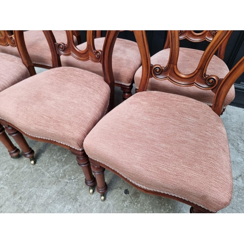 1083 - A set of six Victorian mahogany dining chairs. (6)