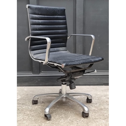 1084 - A contemporary chrome and black leather desk chair.