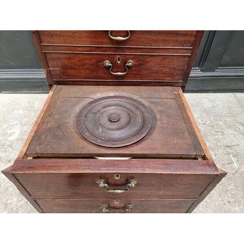 1088 - A George III mahogany commode chest, 59cm wide.