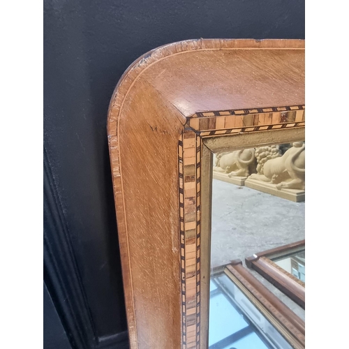 1106 - A pair of late Victorian walnut and parquetry overmantel mirrors, 48 x 81cm; together with a si... 