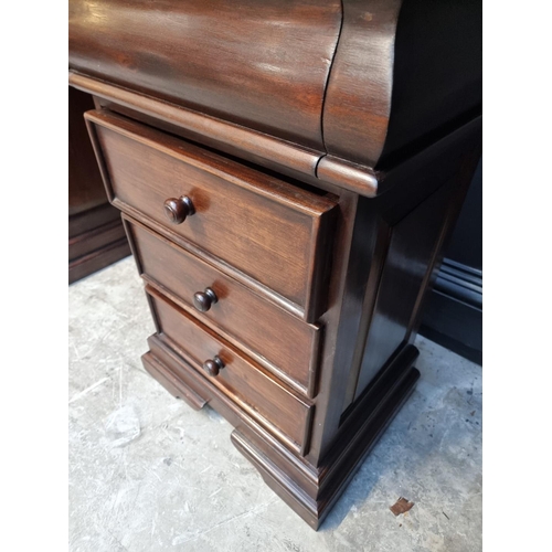 1107 - A reproduction stained hardwood pedestal desk, 152cm wide.