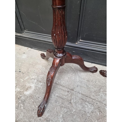 1109 - A pair of mahogany 'bedpost' tripod torcheres, 143.5cm high. (2)