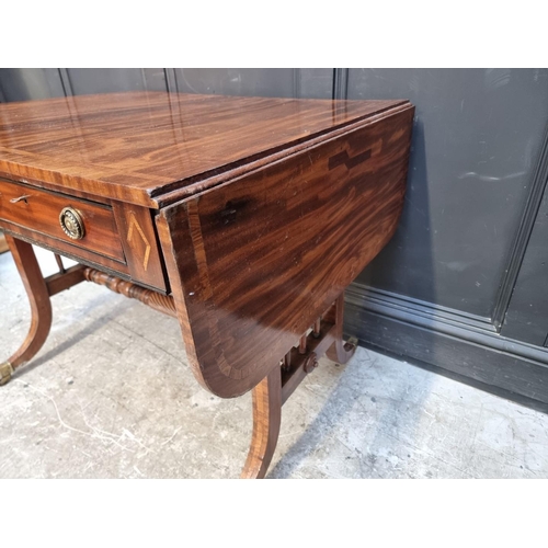 1112 - An early 19th century mahogany and satinwood crossbanded sofa table, stamped 'Gillows Lancaster', 95... 