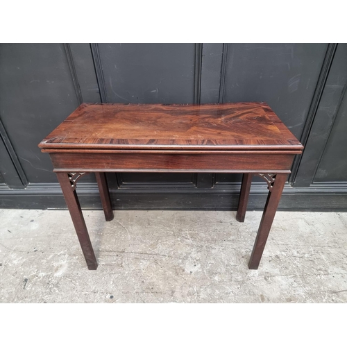 1123 - A George III mahogany rectangular concertina card table, 90.5cm wide, (alterations).... 