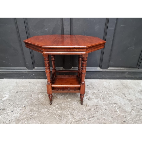 1126 - A Victorian walnut octagonal centre table, 74cm wide.