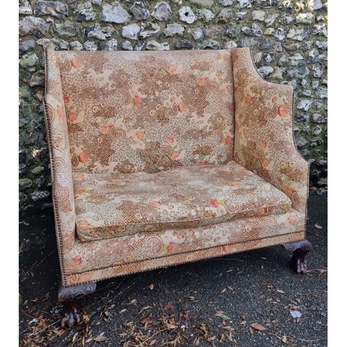 1131 - An antique wingback settee, 123cm wide.