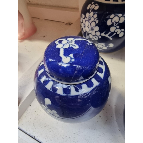 1151 - Nine Chinese blue and white ginger jars and five covers, largest 15cm high. (9)