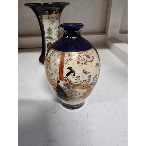 1153 - Seven Satsuma Japanese pottery vases, largest 26cm high. (7)