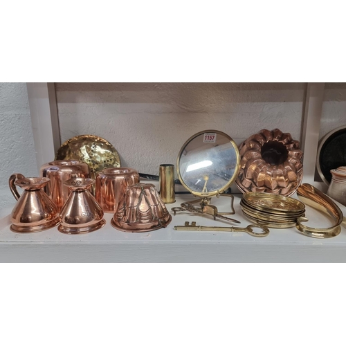 1157 - A collection Victorian copper and brass, to include jelly moulds.