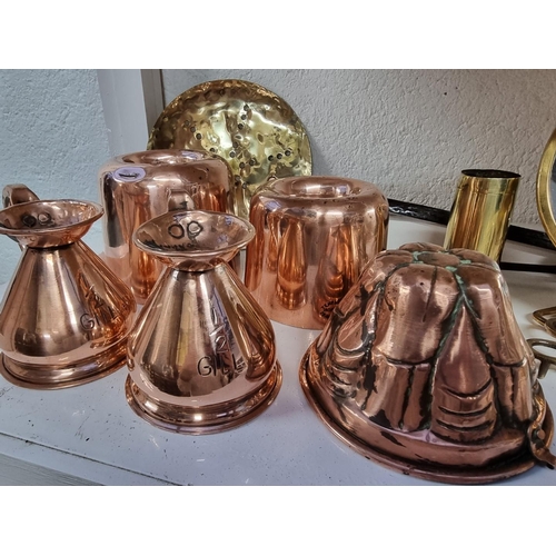 1157 - A collection Victorian copper and brass, to include jelly moulds.