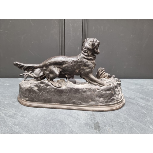 1165 - A Russian cast iron figure group of two gun dogs, 40cm wide. (2)