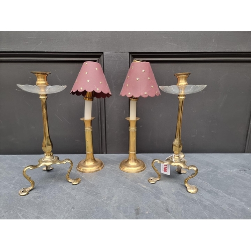 1166 - Two pairs of brass candlesticks. (4)