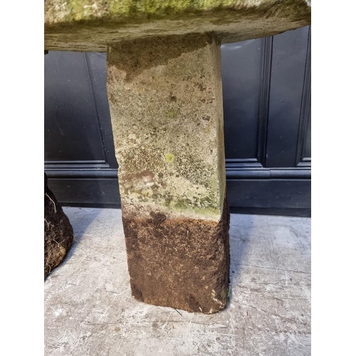 1176 - A near pair of old weathered sandstone staddle stones, 70cm high.