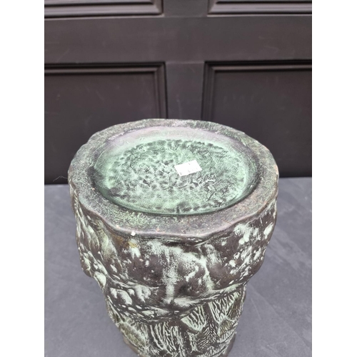 1183 - A large bronzed pottery stick stand, 47cm high.