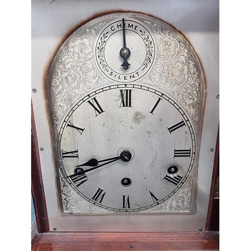 1191 - An early 20th century German mahogany mantel clock, 46cm high, with pendulum.