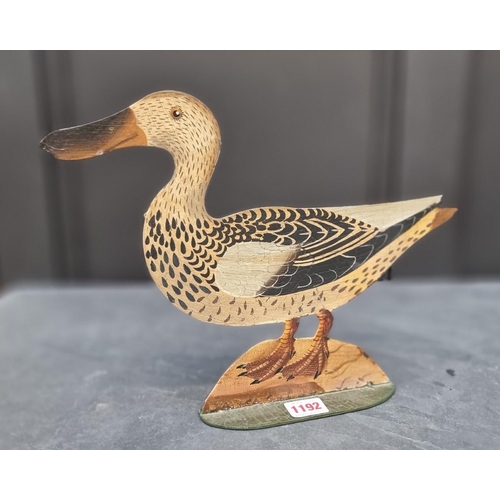 1192 - An old painted sheet metal decoy Duck, double sided, 24.5cm high.