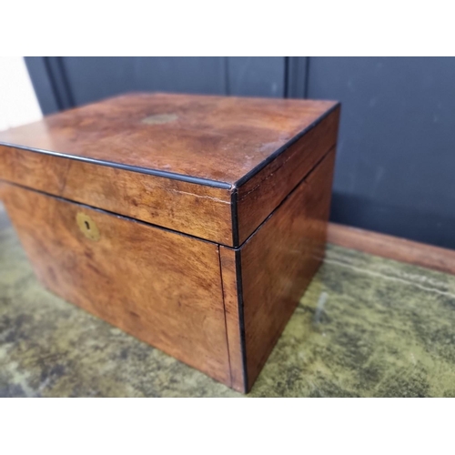 1196 - A late Victorian figured walnut work box, 34cm wide.