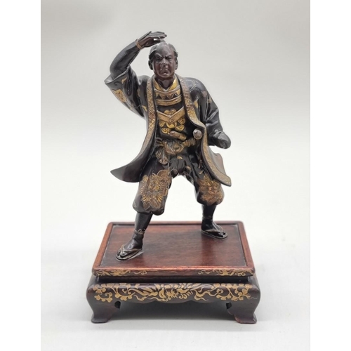 1228 - A Japanese bronze and parcel gilt figure of a Samurai, Meiji, signed Miyao, on hardwood stand, 23cm ... 