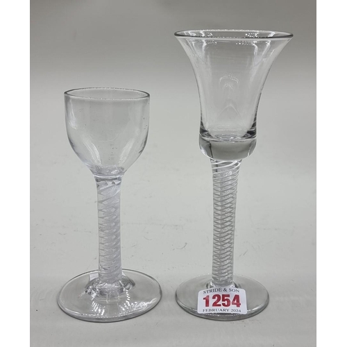 1254 - An antique double series opaque and airtwist wine glass, 17cm high; together with another opaque twi... 