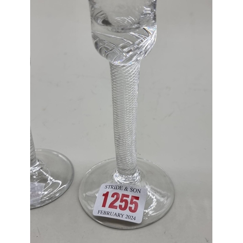 1255 - An antique airtwist wine glass, 16.5cm high; together with an opaque twist ale glass, 16.5cm hi... 