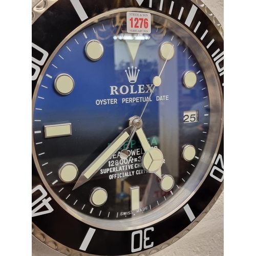 1276 - A Rolex style wall clock, with battery movement, 34cm diameter.