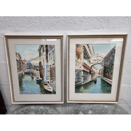 1283 - Italian School, Venetian scenes, a pair, each indistinctly signed, watercolour, 38.5 x 28.5cm. (2)... 