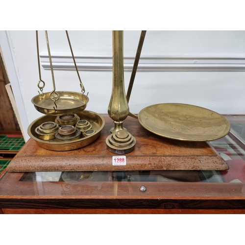 1288 - A large set of Victorian brass balance scales, 66cm high.