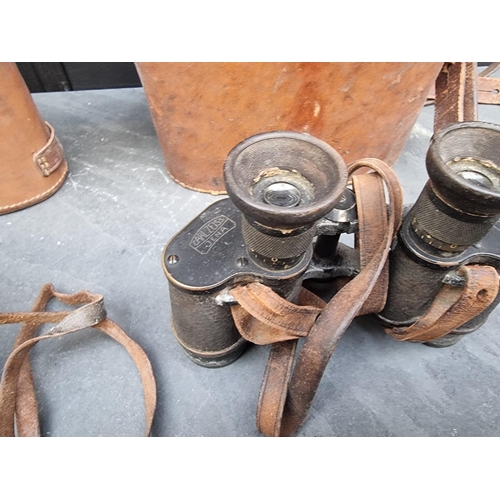 1301 - Three vintage pairs of binoculars, to include: a Zeiss pair. (3)