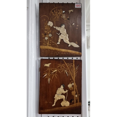 1317 - A pair of Japanese shibayama panels, with bone and shell decoration, 28 x 22cm. (2)... 