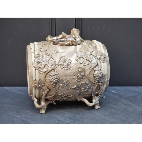 1324 - An unusual Victorian smear glazed and silver lustre spirit barrel and cover, with marbled decoration... 