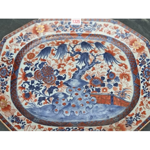 1325 - An 18th century Chinese Imari meat plate, 46cm wide, (hairline crack to rim).