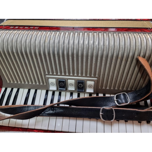 1334 - A Hohner 'Carena IIM' piano accordion, in case.