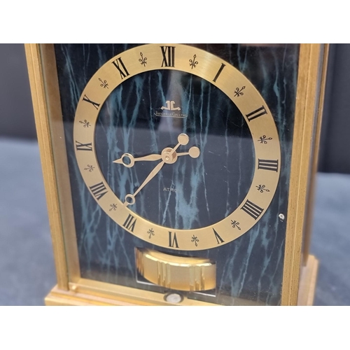 1341 - A Jaeger-LeCoultre Green Embassy Atmos clock, Serial No.353322, with case and instruction booklet.... 