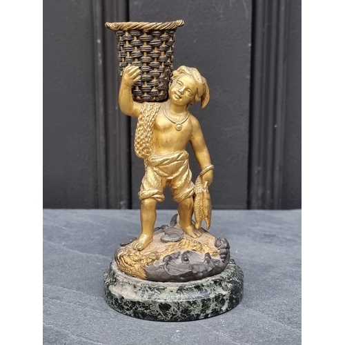 1353 - A gilt bronze fisherboy, on green marble base, 15cm high.