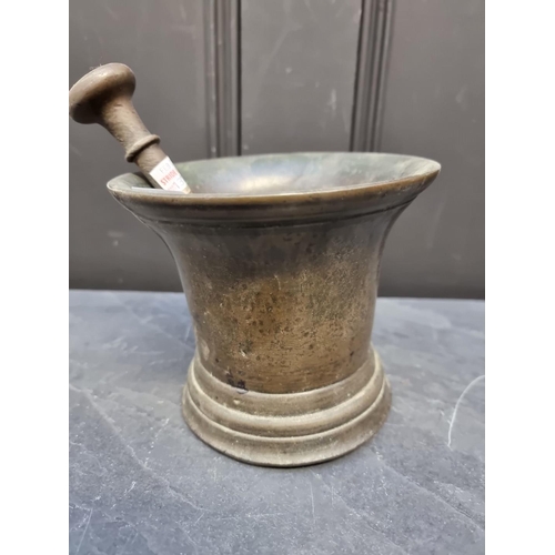 1372 - A large 17th century bronze mortar, 13.5cm high x 15.4cm diameter; with 19.7cm bronze pestle. (2)... 