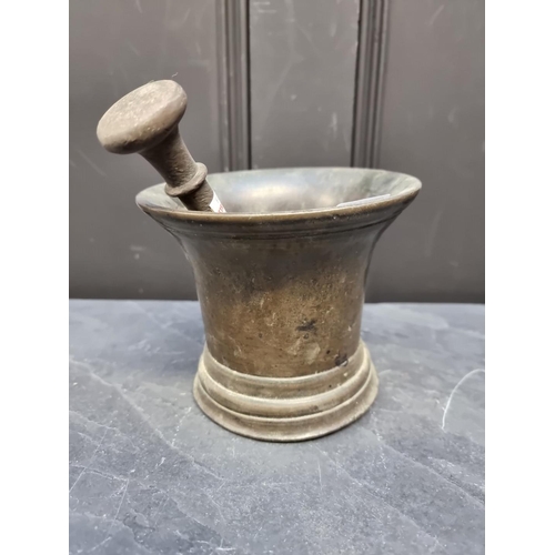 1372 - A large 17th century bronze mortar, 13.5cm high x 15.4cm diameter; with 19.7cm bronze pestle. (2)... 