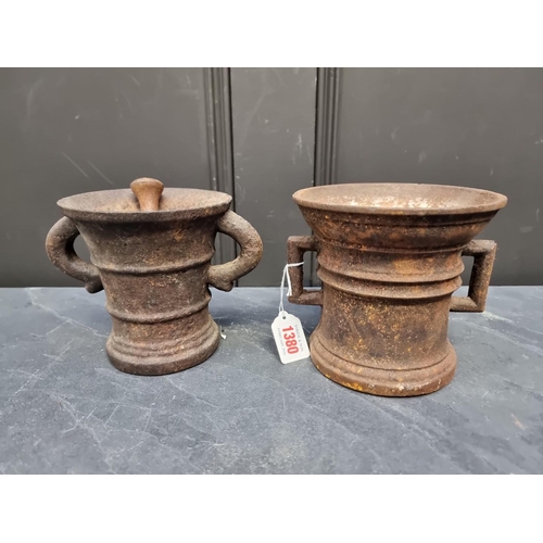 1380 - Two 18th century cast iron mortars, largest 14cm high x 15cm diameter, with a 14.5cm cast iron pestl... 