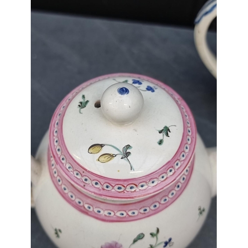 1404 - An interesting late 18th century English creamware teapot and cover, 14.5cm high; together with anot... 