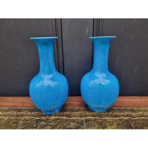 1413 - A pair of Chinese blue glazed vases, 19.5cm high. (2)