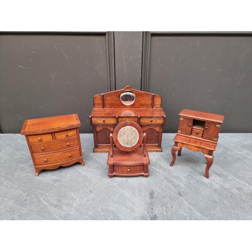 1422 - A group of four miniature apprentice piece furniture items, largest 24.5cm wide.... 