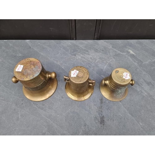 1427 - Three antique brass twin handled mortars, largest 12.6cm high x 14.2cm diameter. (3)... 