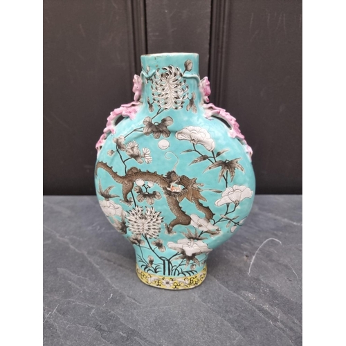 1435 - A Chinese turquoise ground moon flask, 23.5cm high.