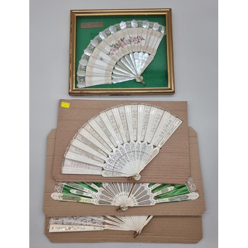 1531 - Four old fans, to include three bone examples, one framed and glazed.