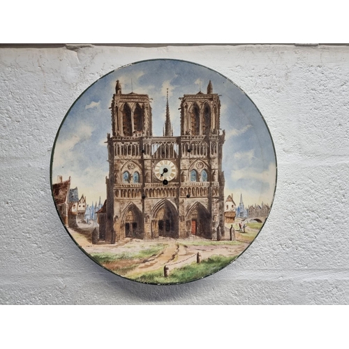 1545 - An unusual Continental clock plate, painted Notre Dame Cathedral, 37.5cm diameter.